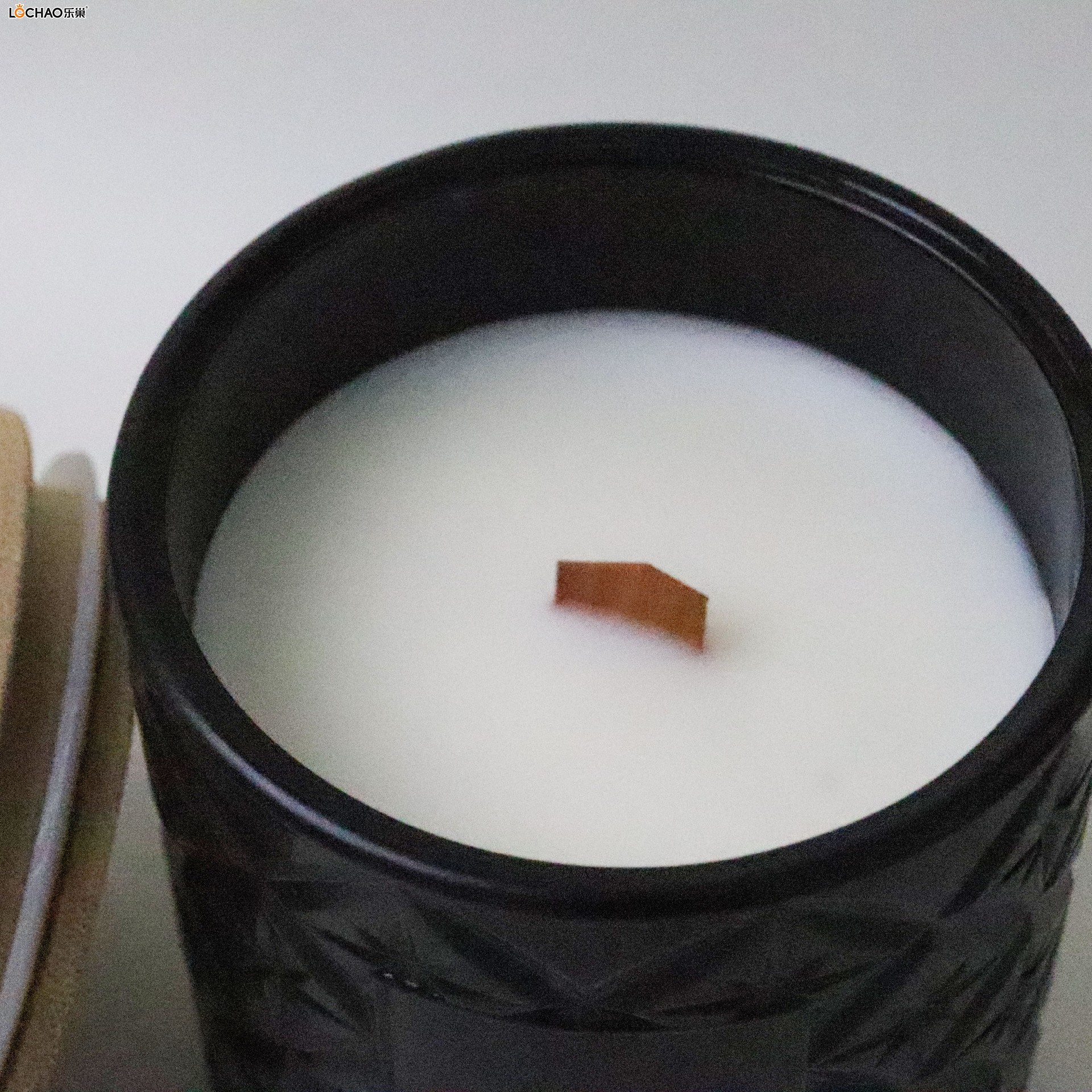 Embossed glass bottle scented candle